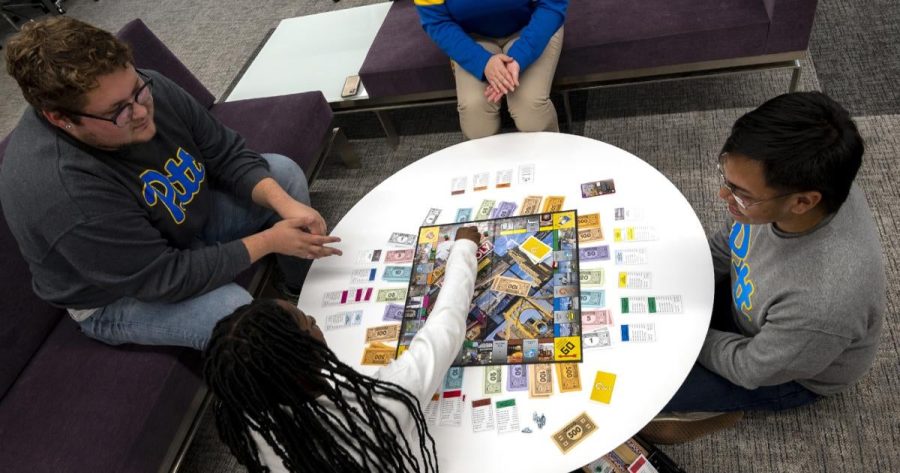 Pitt students play Monopoly. 
