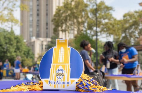 An Alumni Association sign at the Homecoming kick-off event held at the William Pitt Union on Sept. 21, 2021.