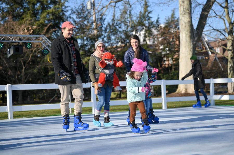 A family ice skates during Winterfest at The Frick on Jan. 15.
