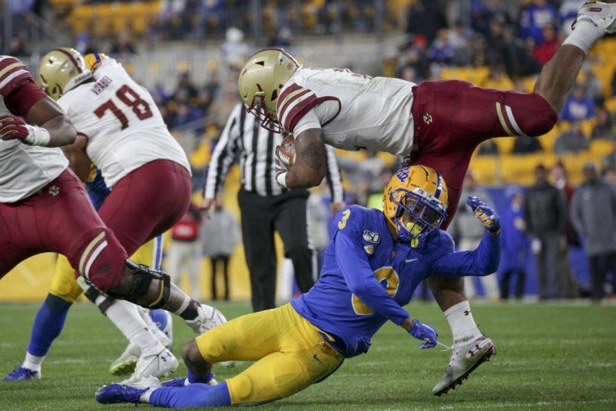 Senior safety Damar Hamlin (3) takes Boston College halfback off his feet during Pitt’s 26-19 loss to the Eagles in November 2019.