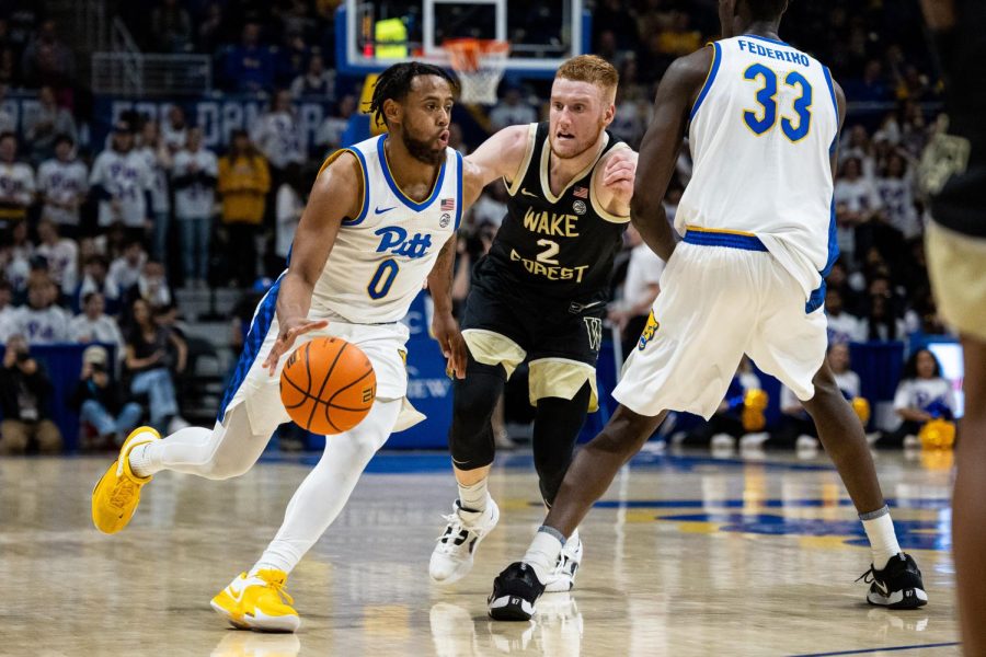 Graduate+student+guard+Nelly+Cummings+%280%29+dribbles+the+ball+during+Pitt+mens+basketballs+game+against+Wake+Forest+on+Wednesday%2C+Jan.+25.