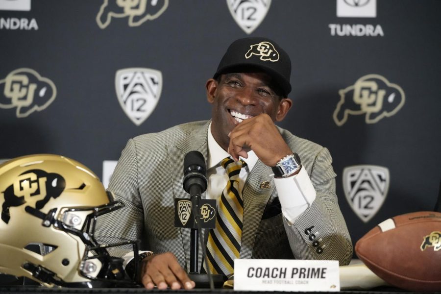 Deion Sanders speaks after being introduced as the new head football coach at the University of Colorado during a news conference Sunday, Dec. 4, 2022, in Boulder, Colorado. 