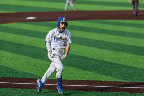 Pitt graduate student infielder Sky Duff (3) celebrates a grand slam during Pitt’s first home ACC series win of the 2021 season against Miami University in April 2021. 