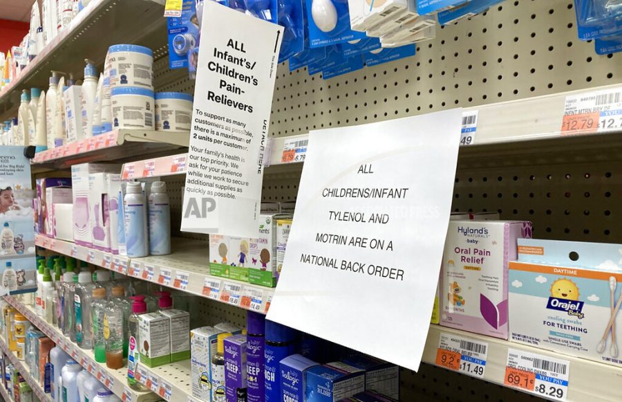 A sign is placed near the section for childrens medicine, Sunday, Dec. 18, 2022 at a CVS in Greenlawn, N.Y. Caring for a sick child has become even more stressful than usual for many U.S. parents in recent weeks due to shortages of Children’s Tylenol and other medicines. (AP Photo/Leon Keith)