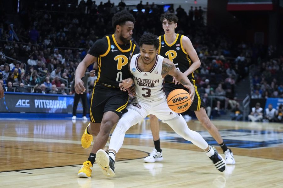 Mississippi States Shakeel Moore (3) is defended by Pittsburghs Nelly Cummings (0) during the second half of a First Four game in the NCAA mens college basketball tournament Tuesday, March 14, 2023, in Dayton, Ohio. 