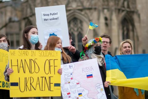 More than 20 students and faculty protested in March 2022 at the Cathedral Lawn in a show of solidarity for the recently invaded Ukraine. 