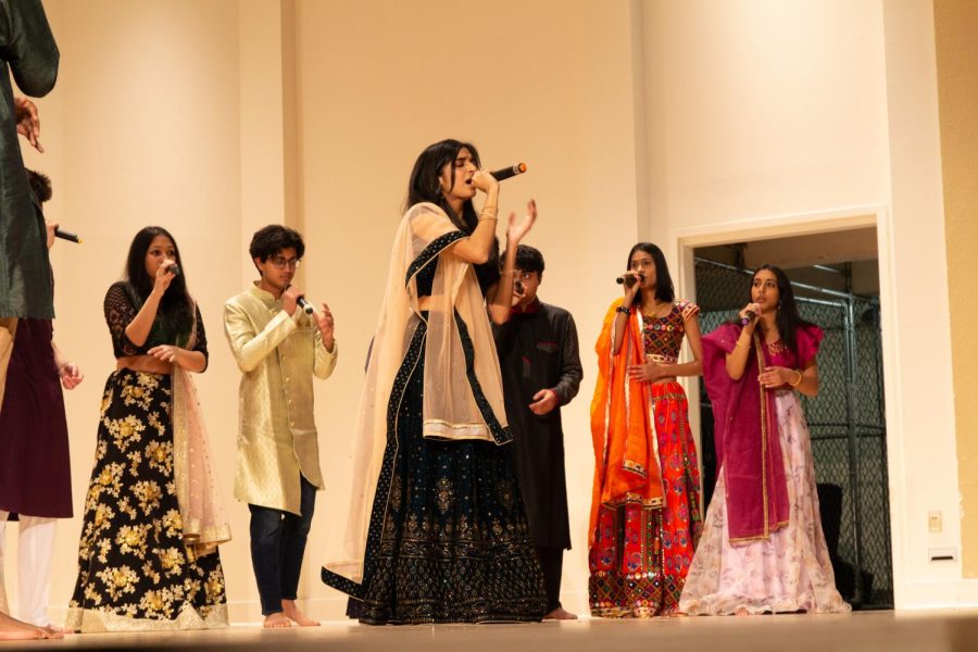 Members of Pitt’s South Asian Student Association sing during the SASA show in Bellefield Hall on Saturday. 