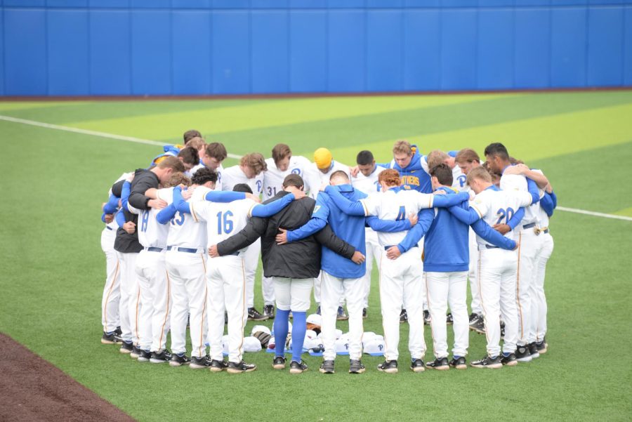 Pitt baseball stands in a huddle before the game against Bucknell on Tuesday, Feb. 28. 