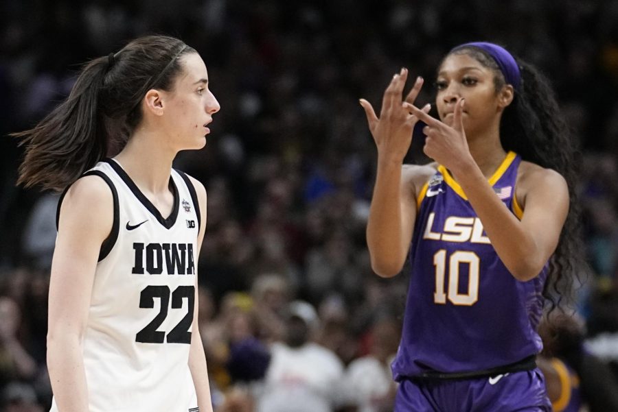 LSUs Angel Reese reacts in front of Iowas Caitlin Clark during the second half of the NCAA Womens Final Four championship basketball game Sunday, April 2 in Dallas. LSU won 102-85 to win the championship. 