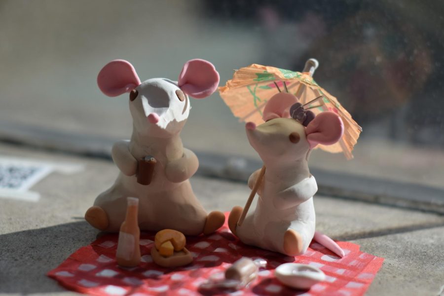 Two sculpted mice are displayed in the Frick Fine Arts building during the Creators Collective Exhibition this weekend. 
