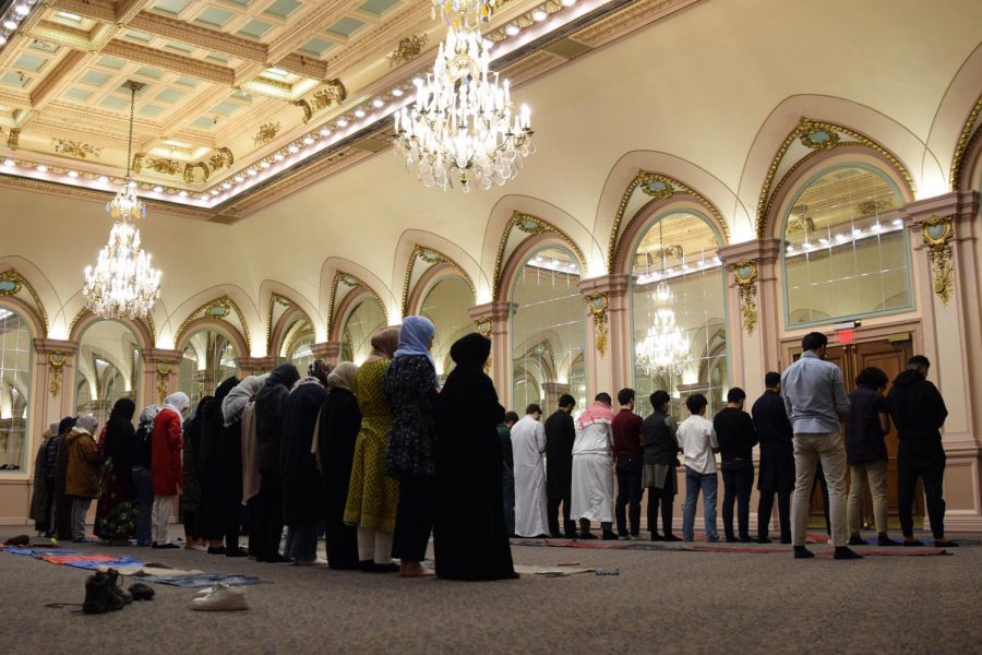Pitt students pray Maghrib, the evening prayer, during the Muslim Student Association’s iftar in the William Pitt Union in April 2022.
