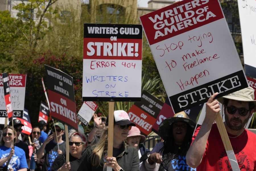 Members of the Writers Guild of America (WGA) picket outside CBS Television City in the Fairfax District of Los Angeles on Tuesday, May 2.