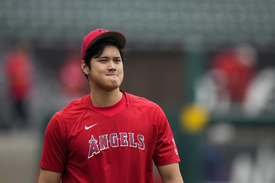 Los Angeles Angels Shohei Ohtani walks on the field as players ready for the teams baseball game against the Chicago Cubs on Tuesday, June 6, 2023, in Anaheim, Calif. 