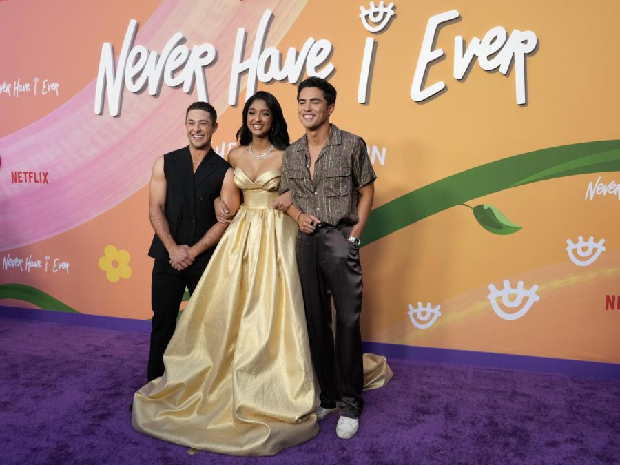 Jaren Lewison, Maitreyi Ramakrishnan and Darren Barnet, from left, cast members in Never Have I Ever, pose together at the Season Four premiere of the Netflix series Thursday, June 1, 2023, at Regency Village Theatre in Los Angeles. 
