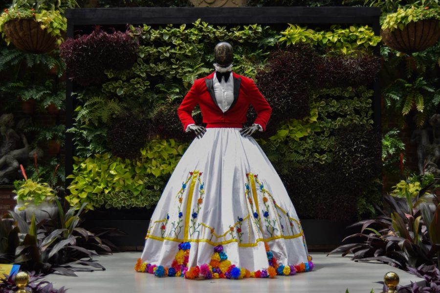 A Pittsburgh-inspired gown on display at the entrance of the  “Flowers Meet Fashion: Inspired by Billy Porter exhibit at Phipps Conservatory. 