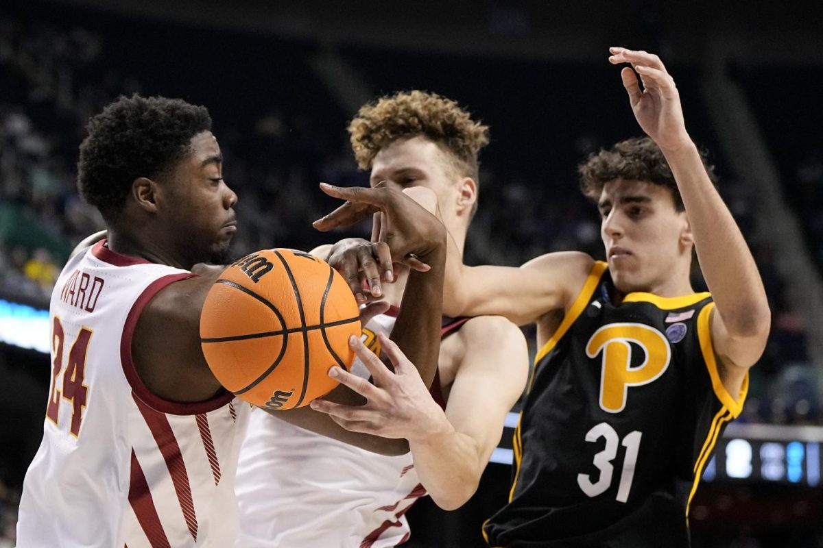Iowa State forward Hason Ward, left, forward Aljaz Kunc vie for the ball with Pittsburgh forward Jorge Diaz Graham during the first half of a first-round college basketball game in the NCAA Tournament on Friday, March 17, 2023, in Greensboro, N.C. 

