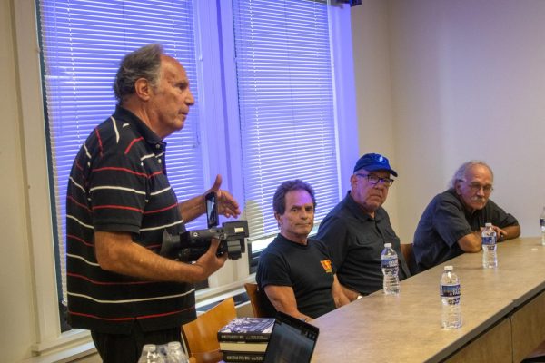 Producer Bruce Spiegel talks about his film “City of Steel” alongside former steel workers during a small screening for students in the William Pitt Union on Monday.