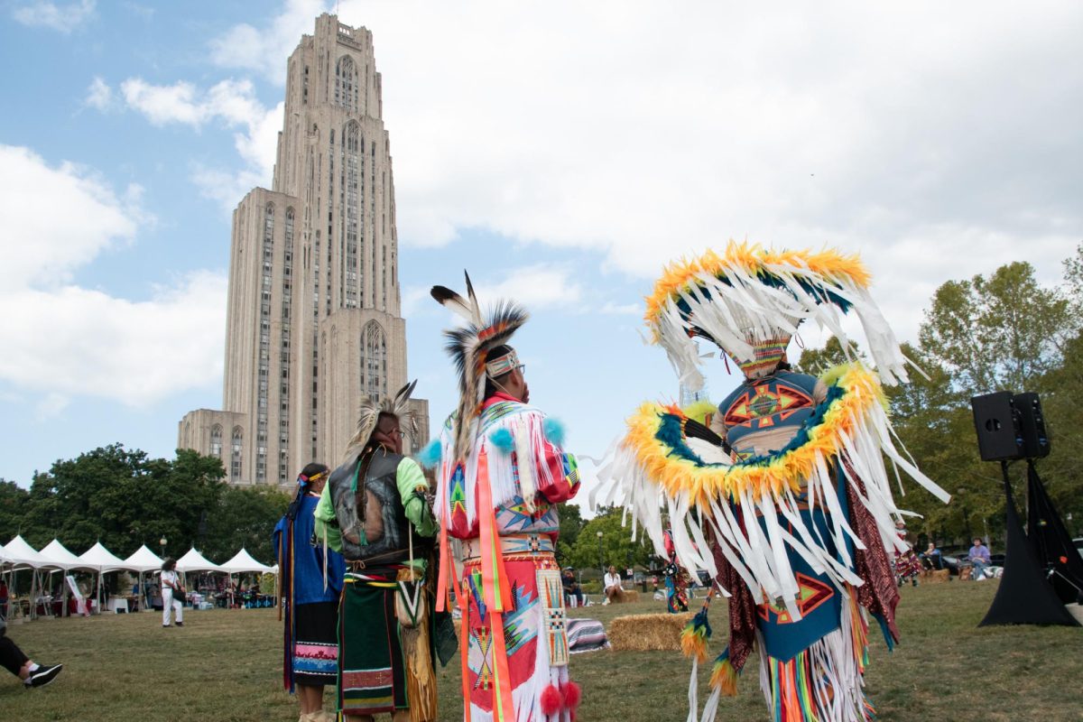 Members of the Council of Three Rivers American Indian Center during the Mini Powwow in Schenley Plaza on Wednesday.