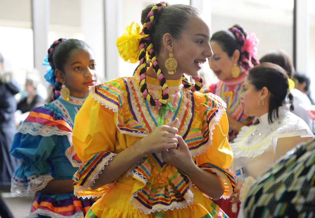 A dancer smiles during the Latin American Festival in Pittsburgh in March 2016.