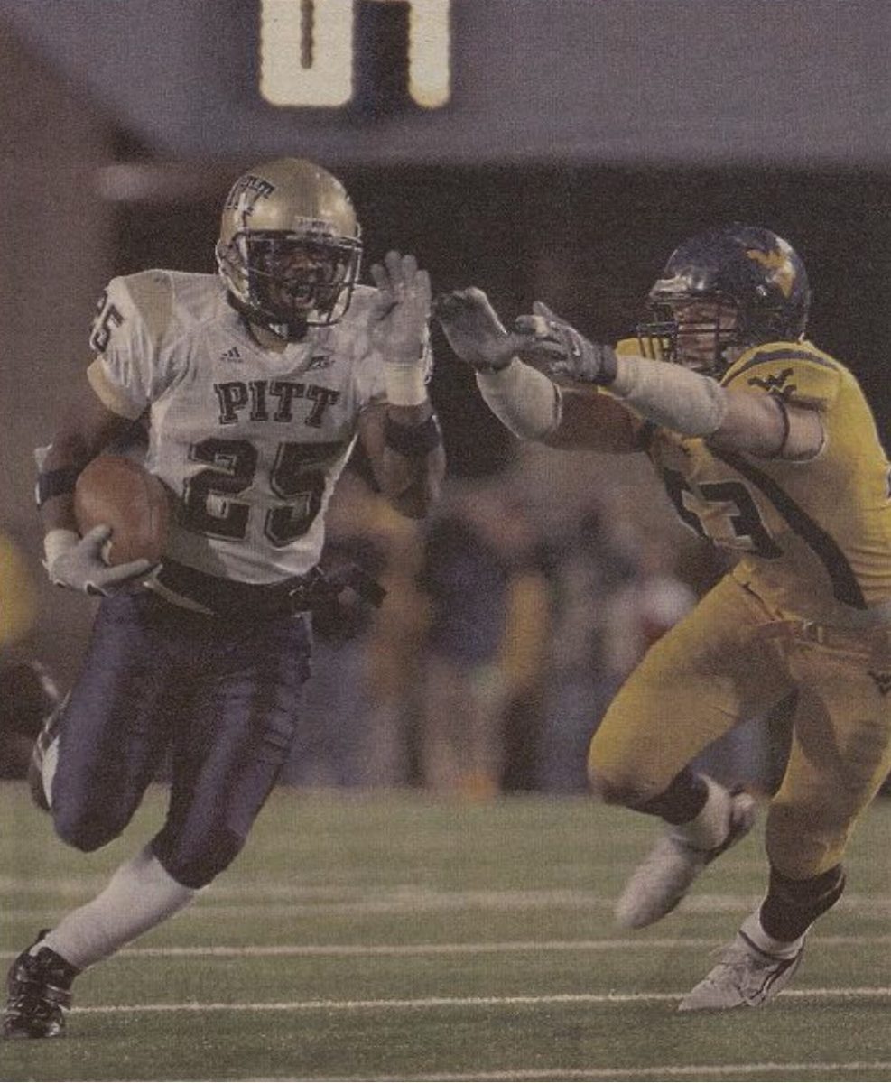 LeSean McCoy runs past Marc Magro for 19 yards, his longest run of the game at the Backyard Brawl on December 1st, 2007.