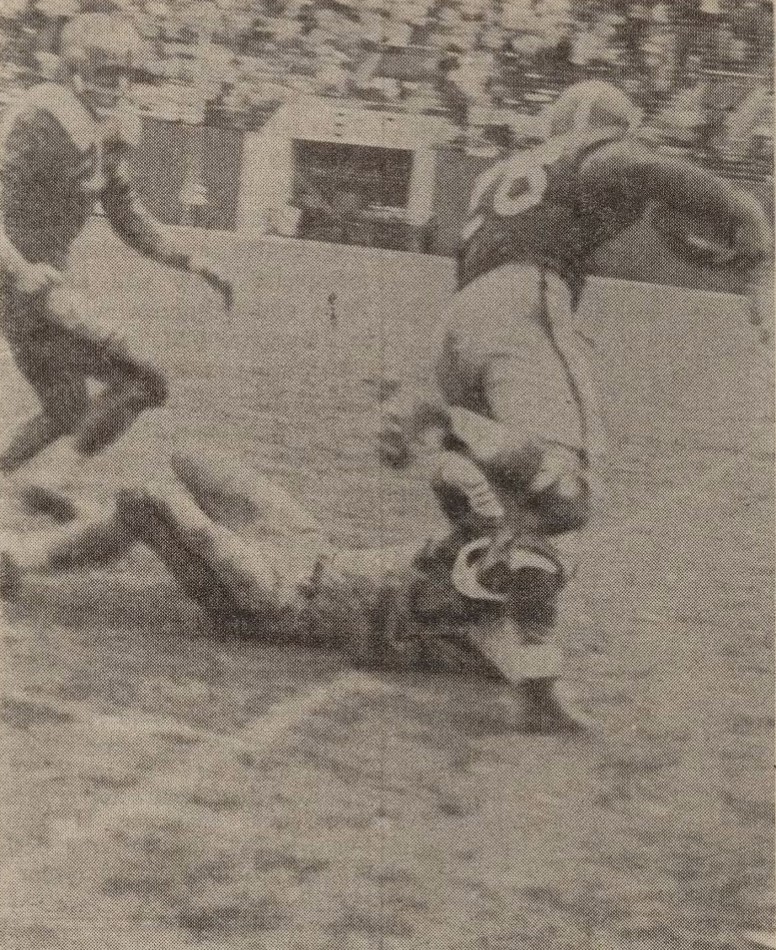 Fred Cox, former Panther halfback, is forced out of bounds on the West Virginia 38, after racing 22 yards with a pass from Jim Traficant during the famous 1961 Backyard Brawl “Garbage Game.”