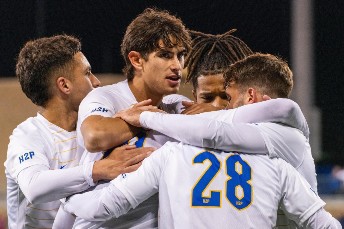 Pitt Panthers celebrate after scoring the first goal during the match against Duquesne at the Ambrose Urbanic Field on Oct. 17.