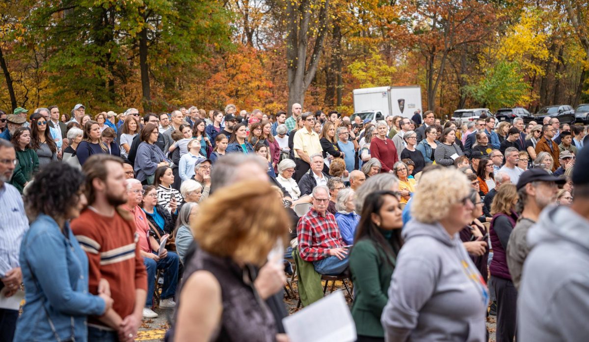 A large crowd stands to watch the 5 year commemoration of the Tree of Life Synagogue Shooting in Schenley Park this Friday. 