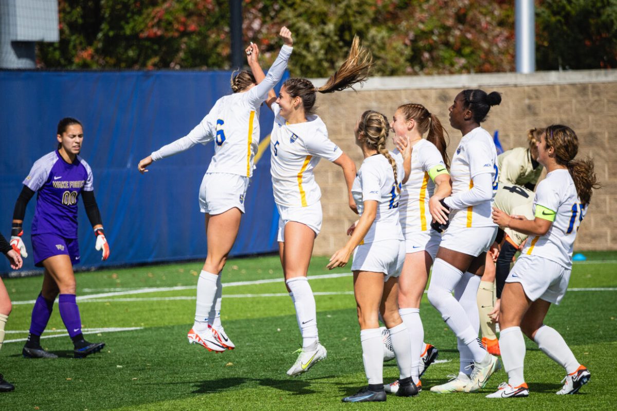 Pitt soccer players celebrate during the game against Wake Forest at Ambrose Urbanic Field on Sunday. 