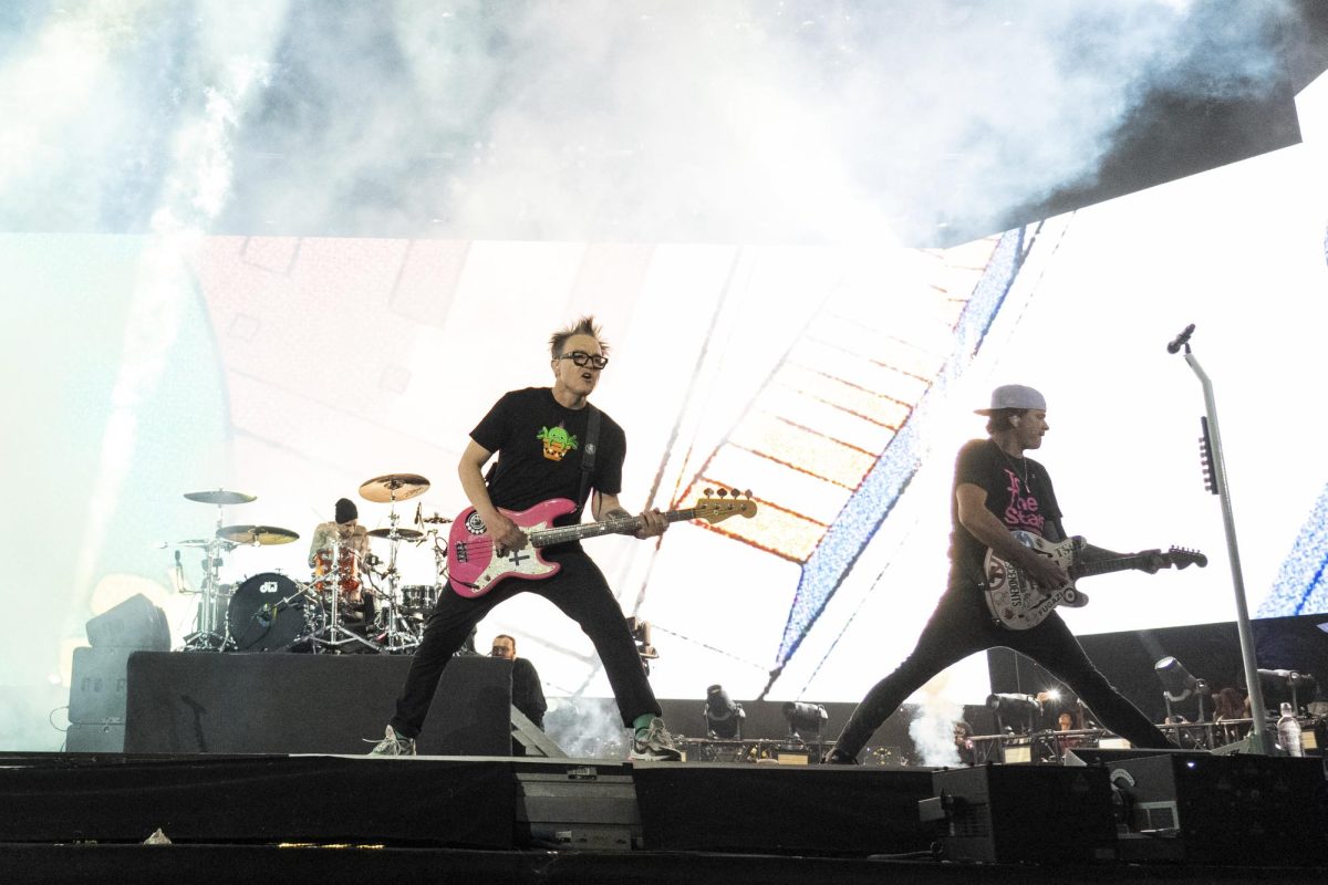 Travis Barker, left, Mark Hoppus, and Tom DeLonge of Blink-182 perform at the Coachella Music and Arts Festival at the Empire Polo Club on Sunday, April 24, in Indio, Calif.