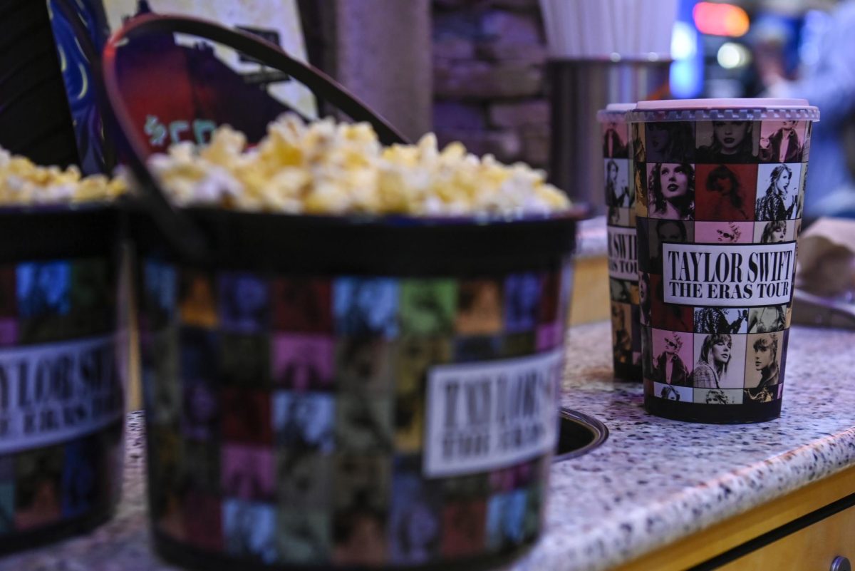 A collection bucket and cup for “Taylor Swift: The Eras Tour” film is sold at Regal Cinemas on Friday, Oct. 13, 2023, in Lynchburg, Va. 