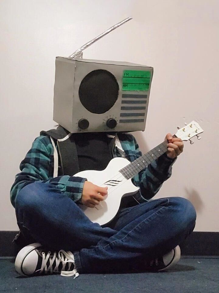 Olive Samsel poses for a photo while dressed as Radiohead for Halloween.