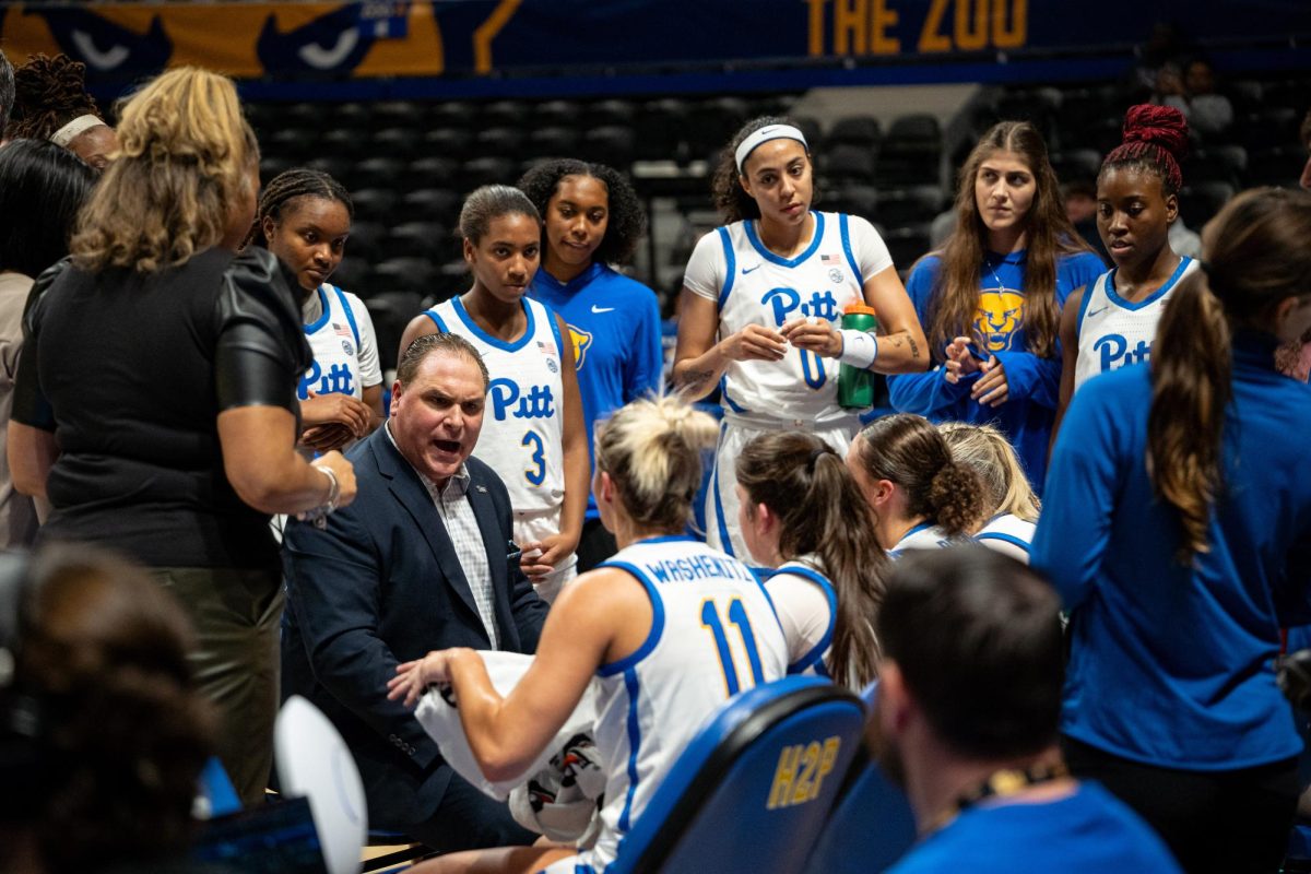 Head Coach Tory Verdi talks with players during Monday night’s exhibition game against Point Park in the Petersen Events Center.