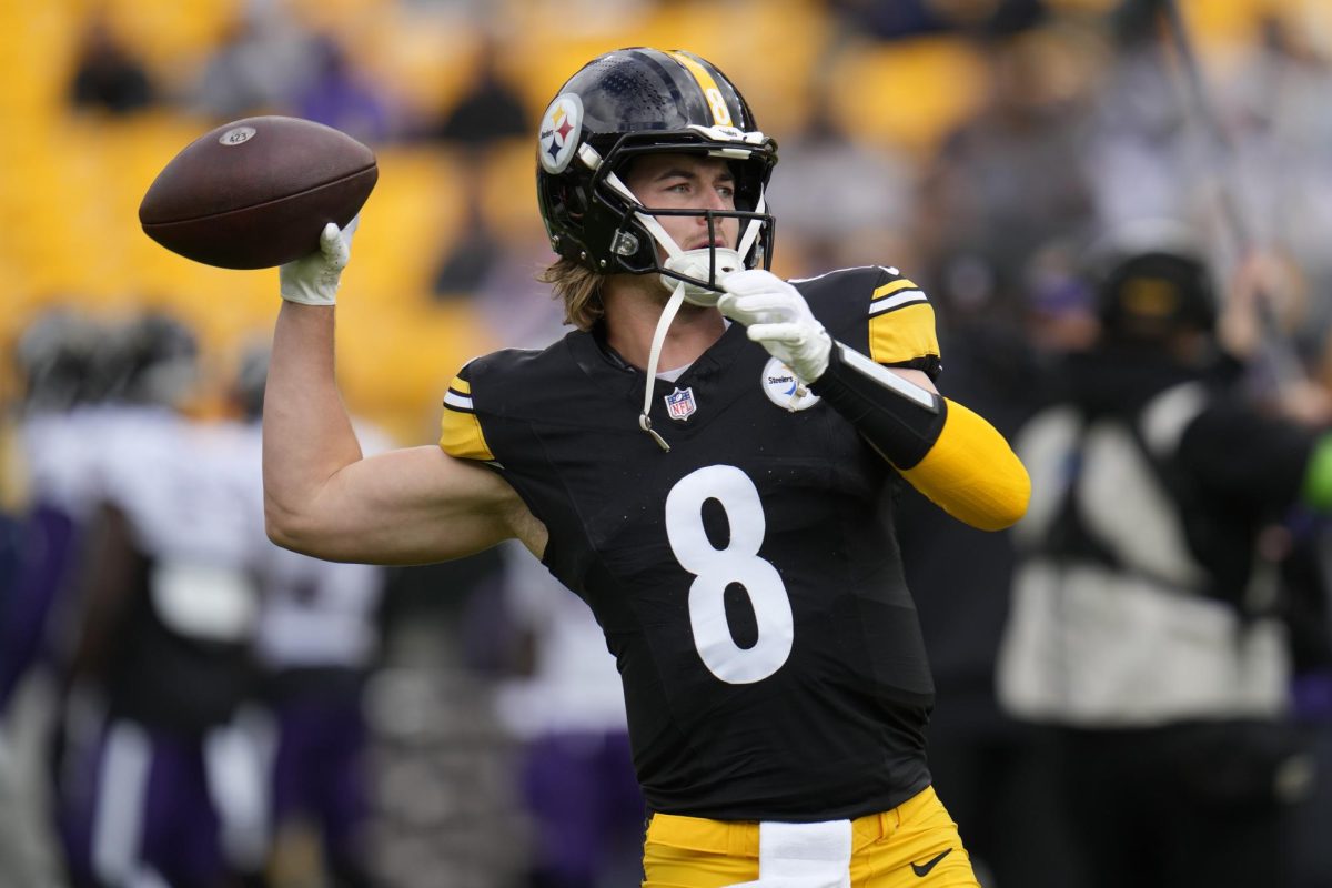 Pittsburgh Steelers quarterback Kenny Pickett (8) warms up before an NFL football game against the Baltimore Ravens in Pittsburgh on Sunday, Oct. 8. 