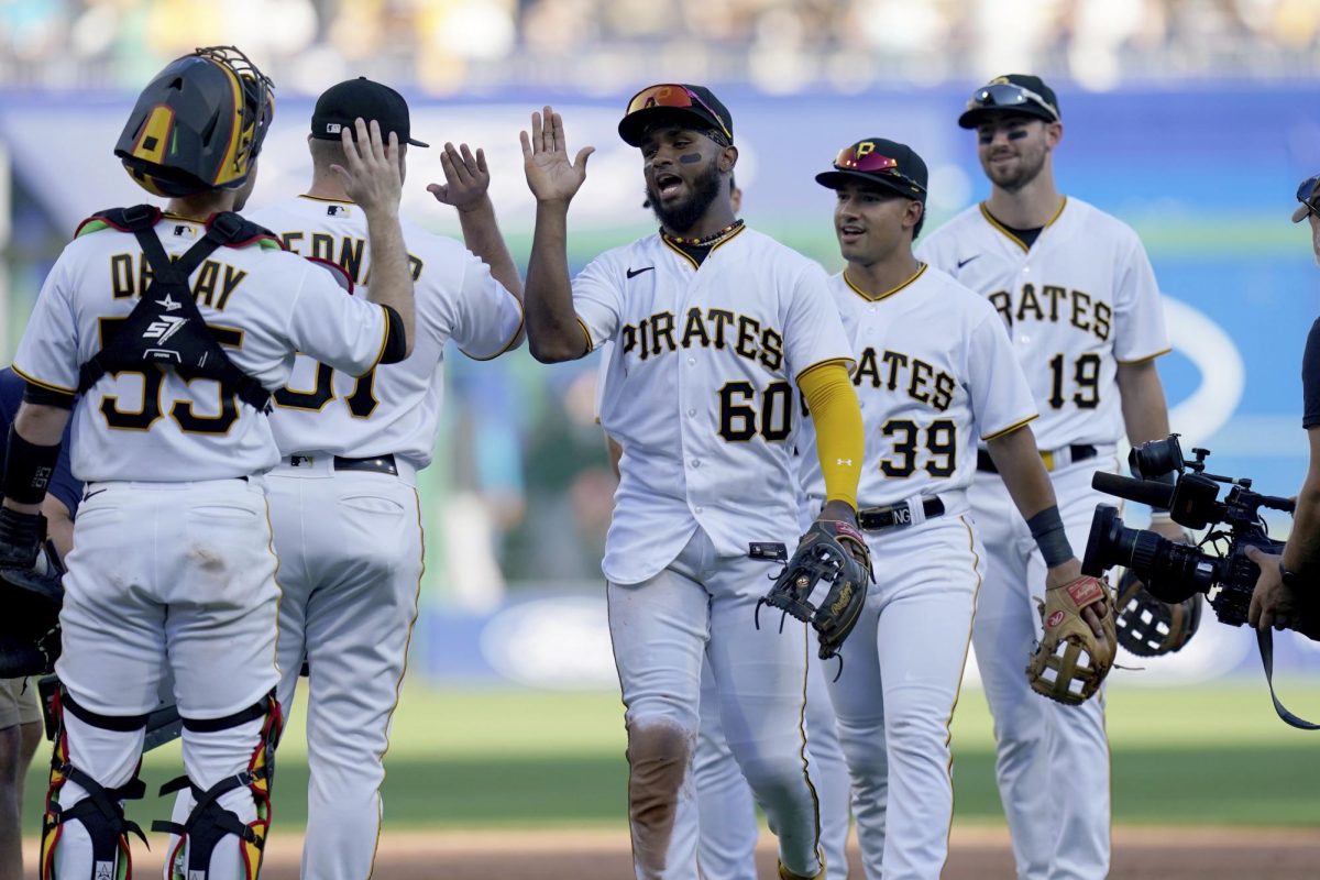 The Pittsburgh Pirates celebrate after getting the final out of a baseball game against the Miami Marlins in Pittsburgh on Sunday, Oct. 1, 2023.