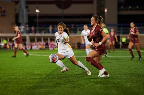 Senior midfielder Chloe Minas (15) competes for the ball during Saturday night’s match against Boston College at the Petersen Sports Complex.