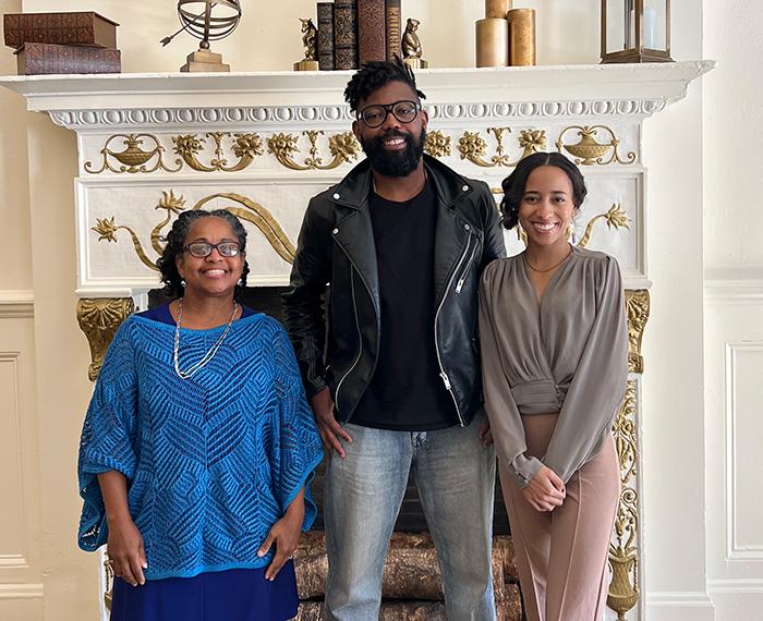 Sherry Sykes (diplomat-in-residence, left), Damon Young (writer-in-residence, center) and Morgan Overton (artist-in-residence, right) pose for a photo.