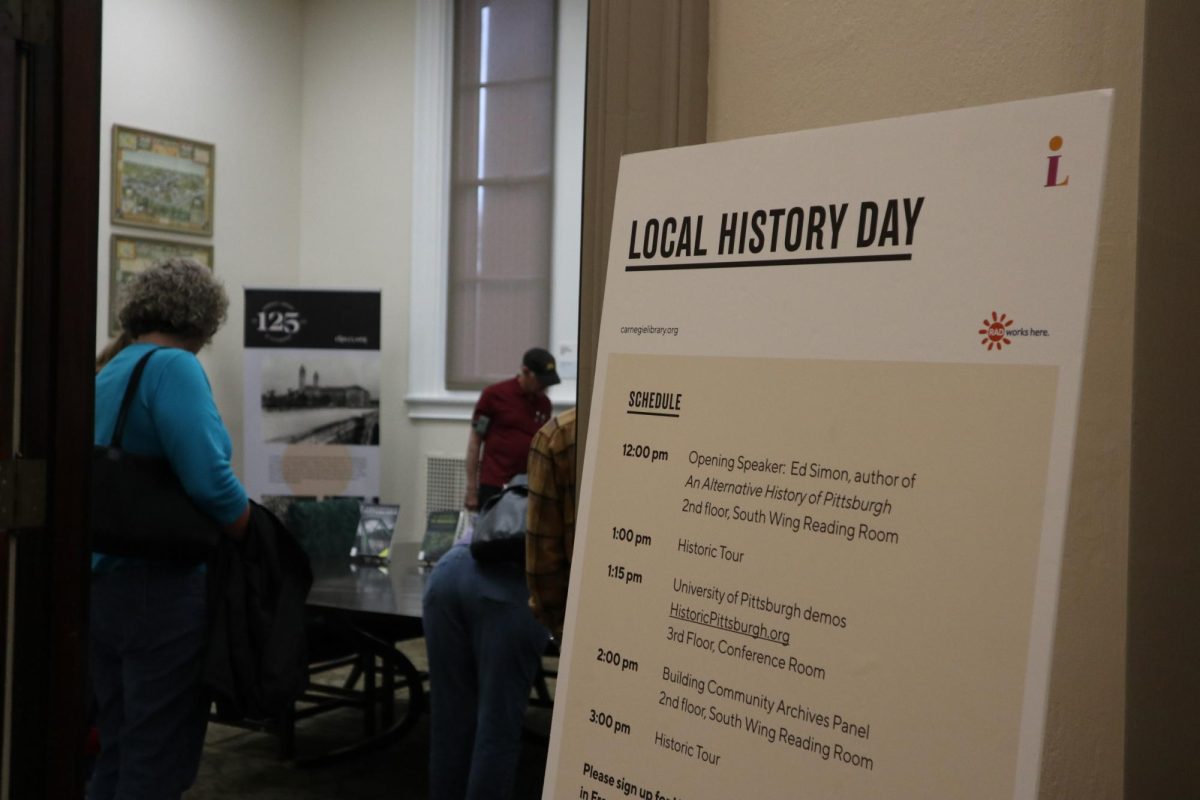 A sign welcomes event participants to Local History Day at the Carnegie Library of Pittsburgh in Oakland on Nov. 4.