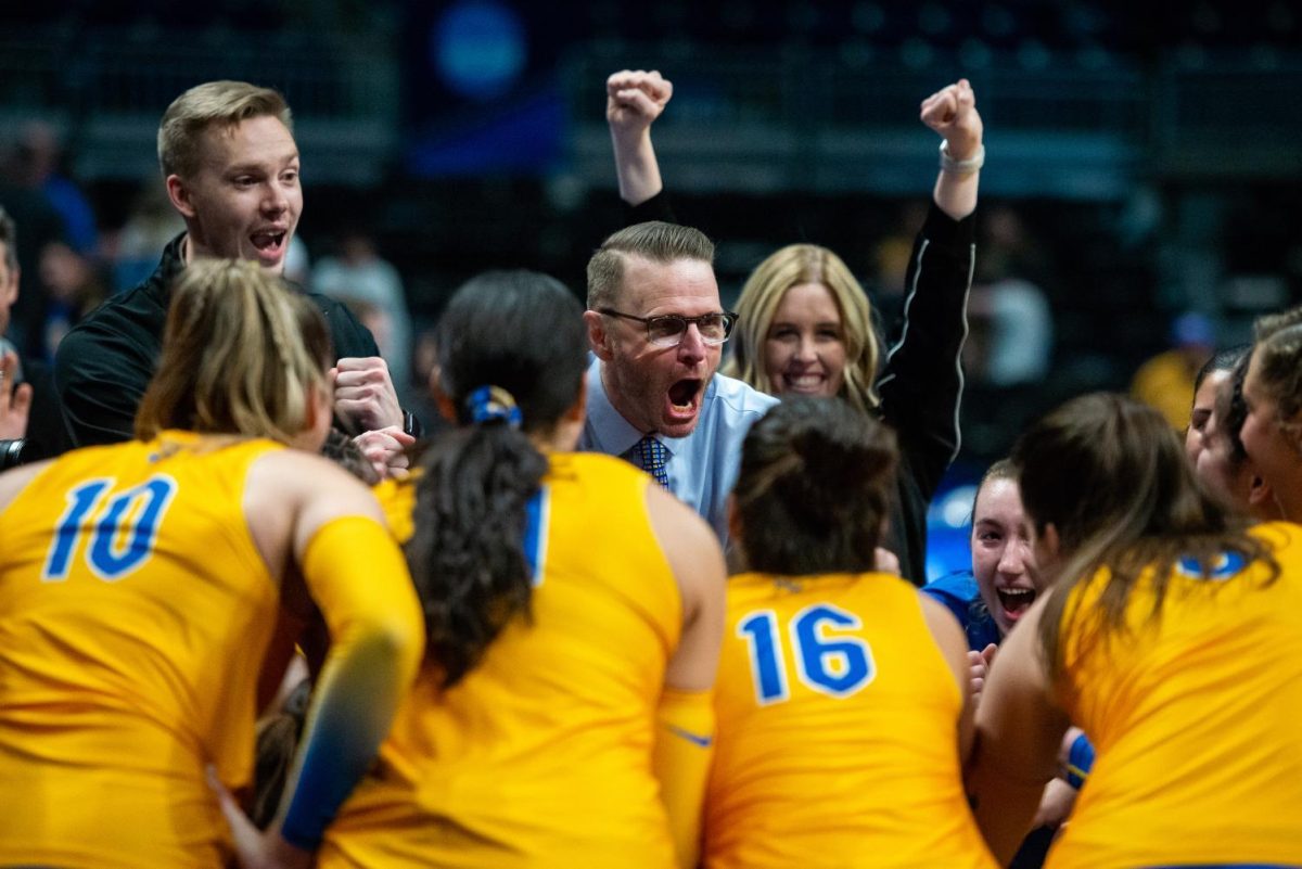 Pitt volleyball coach Dan Fisher yells during Pitts game against BYU in the second round of the NCAA womens volleyball tournament in the Petersen Events Center on Dec. 3, 2022. 