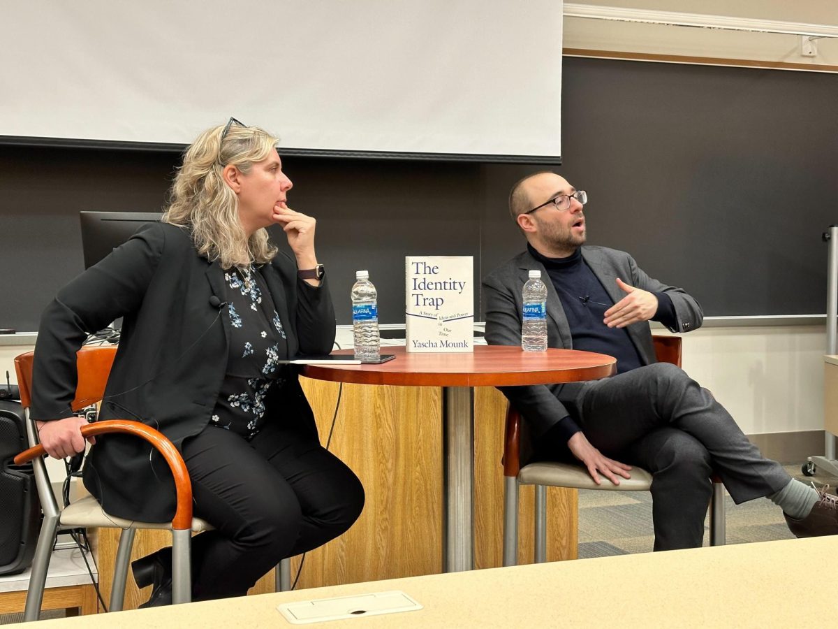 Yascha Mounk, author of “The Identity Trap,” speaks at a Center for Governance and Markets sponsored book talk in the Barco Law Building on Wednesday.
