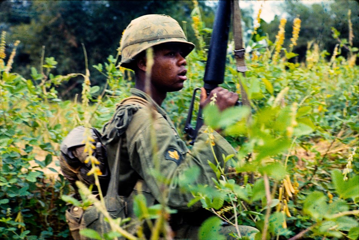 An African-American soldier on patrol in Vietnam in 1966.
