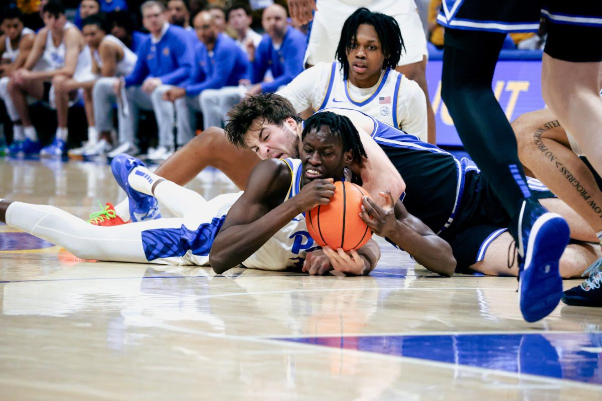 Junior center Federiko Federiko (33) competes for a loose ball during Tuesday night’s game against Duke at the Petersen Events Center. 