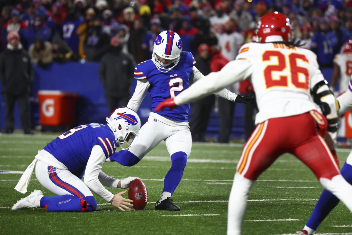 Buffalo Bills kicker Tyler Bass (2) attempts a field goal against the Kansas City Chiefs during the fourth quarter of an NFL AFC division playoff football game, Sunday, Jan. 21, in Orchard Park, N.Y. Bass missed the field goal.