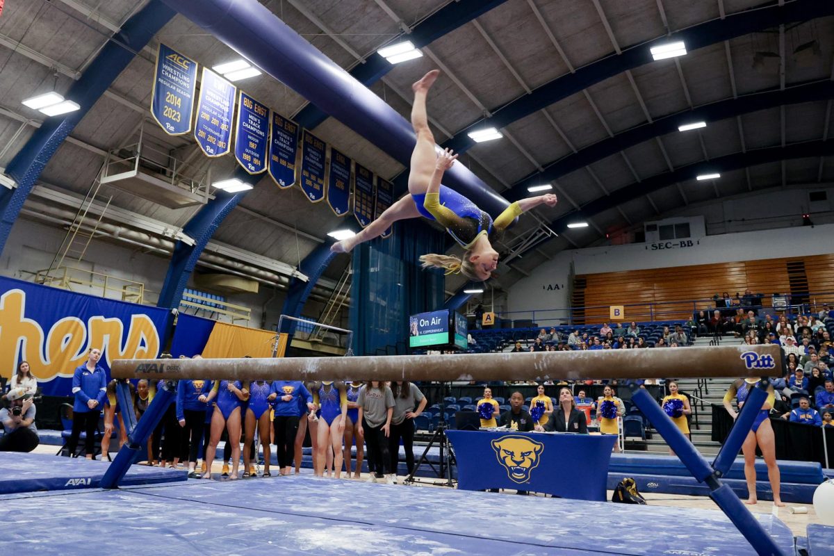 A+Pitt+gymnast+performs+a+beam+routine+during+Saturday%E2%80%99s+meet+against+the+Kent+State+Golden+Flashes+at+the+Fitzgerald+Field+House.