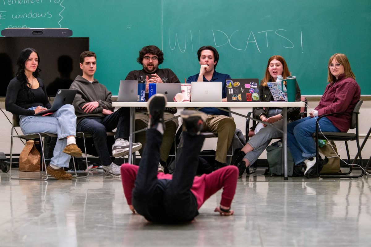 Audition judges react as an actor (Nate Feldman) begins to do the worm on Thursday night. Left to right: choreographer Alyssa Novel, stage manager Colin Eccher, assistant director Samuel Couch, director Patrick Francis, music director Caroline McEligot, music director Lucia Troiano.