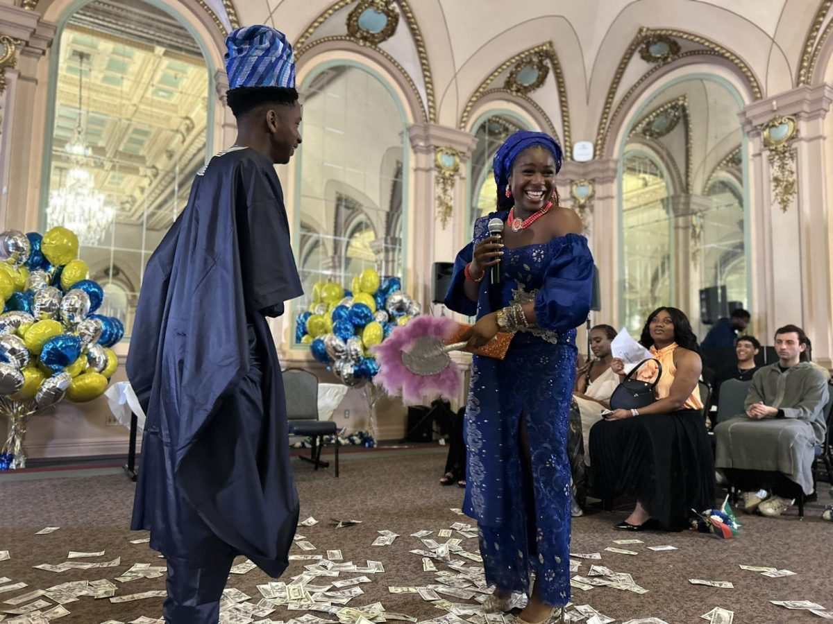 Participants model African wedding traditions at an event hosted by Pitt’s African Student Organization in the William Pitt Union. 