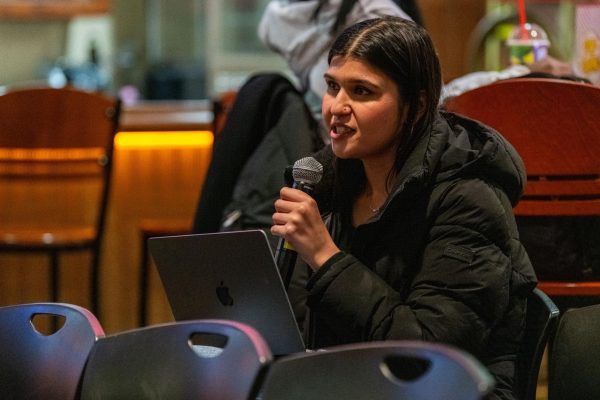 A member of the Pakistani Student Association speaks about the organization’s allocation request during the public meeting on Tuesday in Nordy’s Place. 