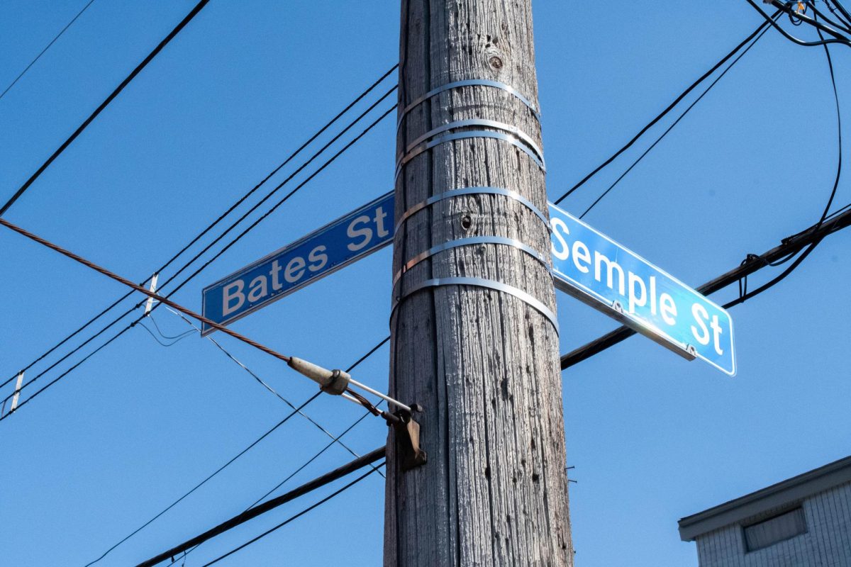 Street signs at the intersection of Bates Street and Semple Street. 