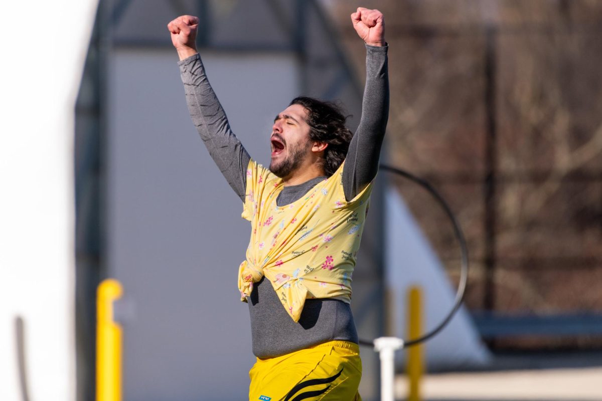 Diego Rojas runs off field after fulfilling their role as flagrunner.