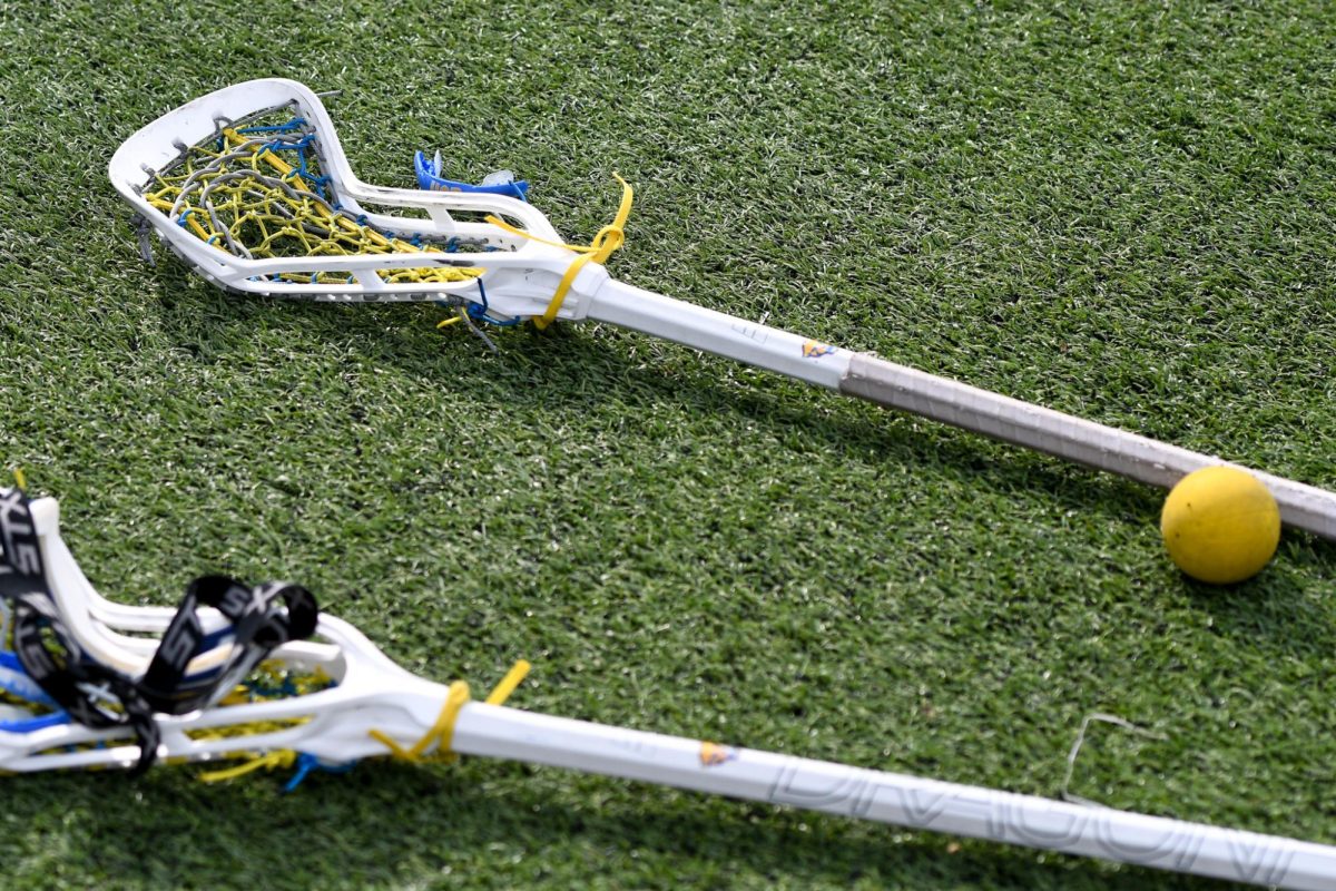 Pitt women’s lacrosse sticks lie on the ground during a game against Notre Dame in 2023.