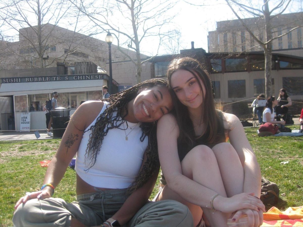 Grace Harris, staff columnist for The Pitt News, poses for a photo with her first-year roommate. 